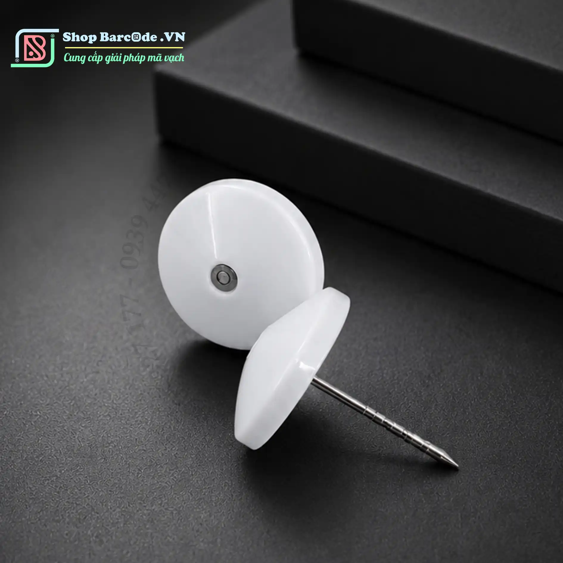 Đinh-gắn-chíp-từ-19mm-bọc-nhựa-trắng-sang-trọng-cho-shop-quần-áo